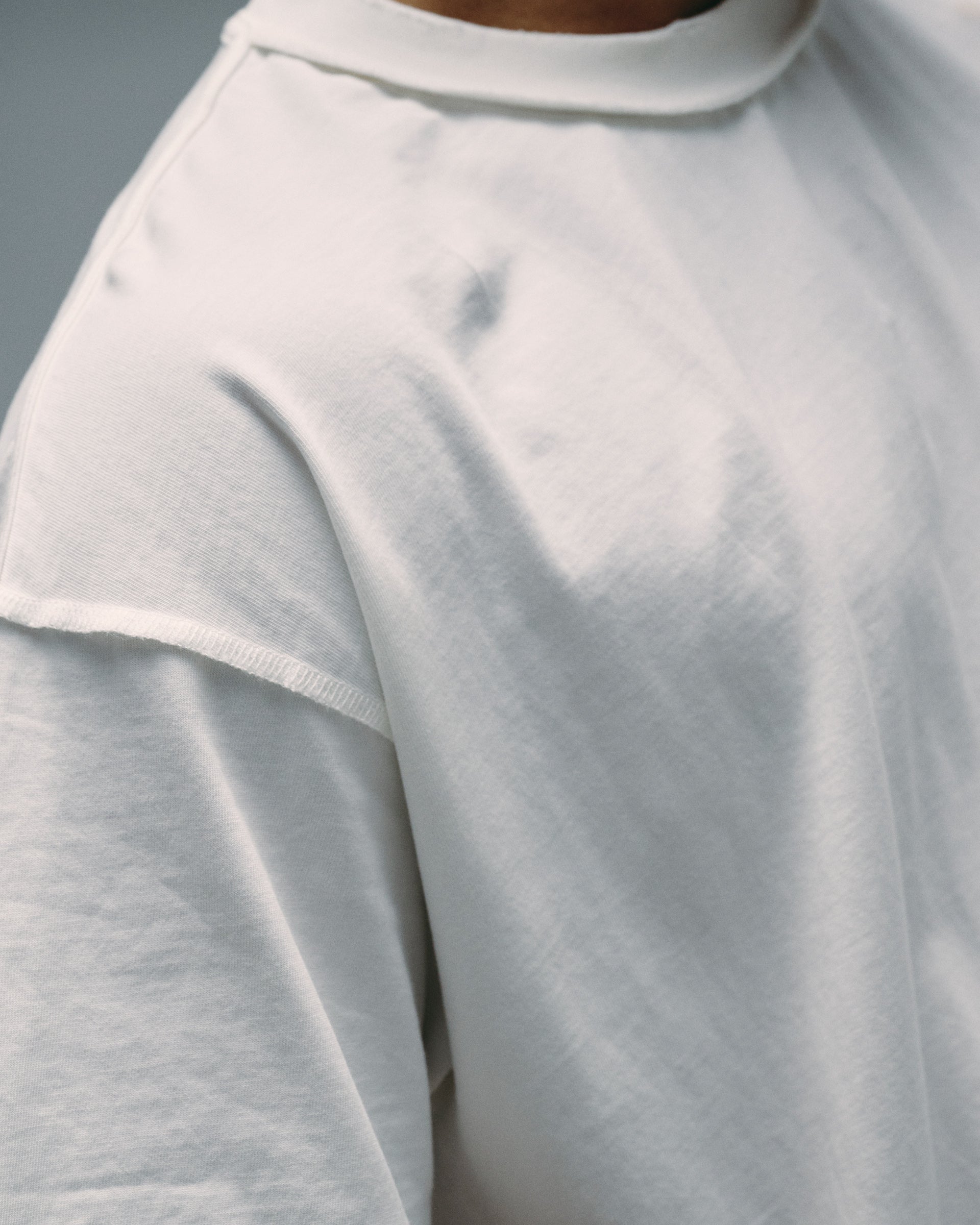 "Necessities" Vintage White Stitch Tee